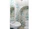 Charming bathroom featuring unique wallpaper, a vintage-style sink, and elegant fixtures, creating a cozy atmosphere at 315 Peachtree Battle Nw Ave, Atlanta, GA 30305