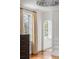 Bedroom features a window, hardwood floors, a dresser and built-in wardrobe at 315 Peachtree Battle Nw Ave, Atlanta, GA 30305