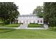 Stately white home featuring a manicured lawn and symmetrical design at 315 Peachtree Battle Nw Ave, Atlanta, GA 30305