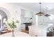 Bright kitchen with white cabinets, stainless steel appliances, and a large island with seating at 315 Peachtree Battle Nw Ave, Atlanta, GA 30305