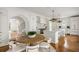 Bright, spacious kitchen featuring white cabinetry, large island, and hardwood floors, perfect for entertaining at 315 Peachtree Battle Nw Ave, Atlanta, GA 30305