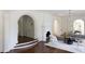 Elegant living room with detailed archways, fireplace, and stylish furniture creating a warm atmosphere at 315 Peachtree Battle Nw Ave, Atlanta, GA 30305
