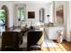 Stylish living room with white couches, wood floors, and neutral decor creating a bright and inviting space at 315 Peachtree Battle Nw Ave, Atlanta, GA 30305
