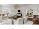 Inviting living room with white sofas, hardwood floors, modern lighting and natural light at 315 Peachtree Battle Nw Ave, Atlanta, GA 30305