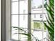 Window view of a beautifully landscaped outdoor space with greenery enhancing the home's appeal at 315 Peachtree Battle Nw Ave, Atlanta, GA 30305