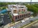 Aerial view showing the building, streetscape, and neighborhood at 112 Rogers Ne St # 207, Atlanta, GA 30317