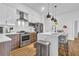 Modern kitchen with stainless steel appliances, white cabinetry, and a stylish backsplash at 112 Rogers Ne St # 207, Atlanta, GA 30317