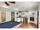 Finished basement with a bar area, game room, and adjacent bathroom at 1861 8Th St, Atlanta, GA 30341