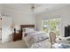This cozy bedroom includes a large window, neutral paint, and plush carpeting at 1861 8Th St, Atlanta, GA 30341