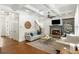 Living room featuring hardwood floors, fireplace and coffered ceilings at 1861 8Th St, Atlanta, GA 30341