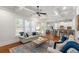 Bright living room with coffered ceilings, hardwood floors, and an open floor plan at 1861 8Th St, Atlanta, GA 30341