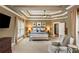 Spacious main bedroom with tray ceilings, ceiling fan, and neutral color palette at 1861 8Th St, Atlanta, GA 30341