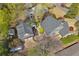 Aerial view of home showcasing the roof, landscaping, and layout of the property within its surroundings at 645 Iroquois Ne Dr, Marietta, GA 30060