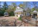 Exterior features of the home include a pool, guest house, and additional garage at 645 Iroquois Ne Dr, Marietta, GA 30060