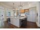 Gourmet kitchen with a large center island, modern appliances, and custom cabinetry at 645 Iroquois Ne Dr, Marietta, GA 30060