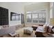 Comfortable living room featuring custom wine racks and neutral decor at 645 Iroquois Ne Dr, Marietta, GA 30060