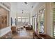 Open concept living area with stone flooring, plenty of natural light, and a comfortable seating area at 645 Iroquois Ne Dr, Marietta, GA 30060