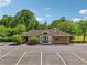 Exterior of the fitness center boasting ample parking, promising a convenient workout experience at 6935 Wakehurst Pl, Cumming, GA 30040