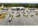 Aerial view of a commercial lot featuring a Publix store, surrounded by ample parking and shopping areas at 209 Brynn Ln, Mcdonough, GA 30252