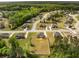 A high aerial view of a neighborhood, showcasing the home's setting amongst lush green trees at 209 Brynn Ln, Mcdonough, GA 30252