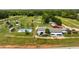 Aerial view showing rows of plants and buildings with open and closed roofs, offering a unique layout at 209 Brynn Ln, Mcdonough, GA 30252