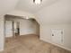 Bedroom featuring neutral paint, plush carpet, and access to two other rooms at 209 Brynn Ln, Mcdonough, GA 30252