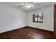 Bedroom with hardwood floors, window for natural light, and a ceiling fan at 2763 Macby Walk, Marietta, GA 30066