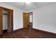 Bedroom features hardwood floors, ceiling fan, closet, and access to ensuite bath at 2763 Macby Walk, Marietta, GA 30066