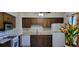 Traditional kitchen features stainless steel appliances and wood cabinetry at 2763 Macby Walk, Marietta, GA 30066
