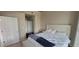 Cozy bedroom with neutral decor, natural light, and ensuite bathroom at 3324 Peachtree Ne Rd # 905, Atlanta, GA 30326