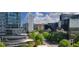 Stunning city view featuring modern buildings, lush trees, and clear blue skies at 3324 Peachtree Ne Rd # 905, Atlanta, GA 30326