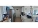 Well-lit modern kitchen featuring stainless steel appliances and white cabinets at 3324 Peachtree Ne Rd # 905, Atlanta, GA 30326