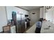 Well-lit modern kitchen with stainless steel appliances and white cabinetry at 3324 Peachtree Ne Rd # 905, Atlanta, GA 30326