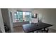 An open concept living area with a view of the city, dining room and modern sofa at 3324 Peachtree Ne Rd # 905, Atlanta, GA 30326