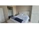 Charming main bedroom features a luxurious bed and ample closet space at 3324 Peachtree Ne Rd # 905, Atlanta, GA 30326