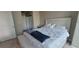 Comfortable main bedroom featuring a plush bed, neutral tones, and ample closet space at 3324 Peachtree Ne Rd # 905, Atlanta, GA 30326