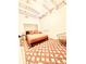 Bright bedroom with neutral walls, a black bed frame, and vibrant geometric rug at 380 Amal Sw Dr, Atlanta, GA 30315