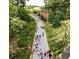 Atlanta's Beltline Westside Trail in a wooded area is populated with walkers and bike riders enjoying the outdoors at 380 Amal Sw Dr, Atlanta, GA 30315