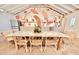 Bright dining area featuring a large table with seating for six, next to the kitchen at 380 Amal Sw Dr, Atlanta, GA 30315