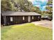 Home exterior exhibiting well-maintained lawn and parking space at 380 Amal Sw Dr, Atlanta, GA 30315