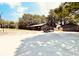 Spacious property features a long barn style building with a large front yard and truck at 380 Amal Sw Dr, Atlanta, GA 30315