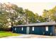 Dark siding and a well maintained lawn highlight this home's exterior at 380 Amal Sw Dr, Atlanta, GA 30315