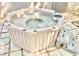 Relax in this hexagon hot tub, surrounded by a stone paver patio and pebbles at 380 Amal Sw Dr, Atlanta, GA 30315