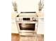 Stainless steel Frigidaire electric range adds sleek functionality to this modern kitchen at 380 Amal Sw Dr, Atlanta, GA 30315