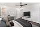 Well-lit bedroom features a vanity, attached bathroom, and ceiling fan at 2760 Swansea Ct, College Park, GA 30349