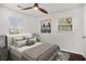 Updated bedroom with neutral decor, two windows and dark hardwood floors at 2760 Swansea Ct, College Park, GA 30349