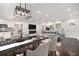 Bright open-concept living area with a modern kitchen, dining space, and comfortable seating area at 2760 Swansea Ct, College Park, GA 30349