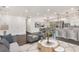 Spacious open-concept living area featuring a modern kitchen and a comfortable seating arrangement at 2760 Swansea Ct, College Park, GA 30349