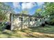 A view of the backyard from the side of the home at 299 Ard Nw Pl, Atlanta, GA 30331