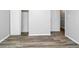 Bedroom features wood-look flooring and closet space at 299 Ard Nw Pl, Atlanta, GA 30331